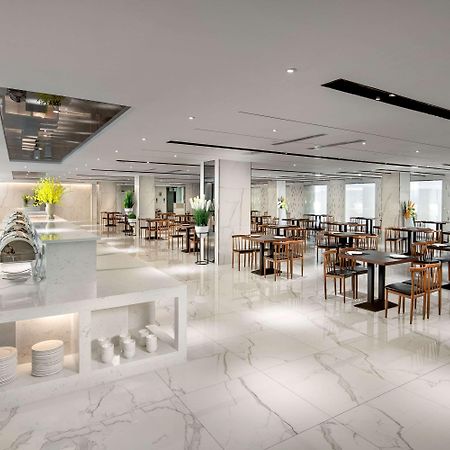 Ramada By Wyndham Mengzi Suites Exterior photo