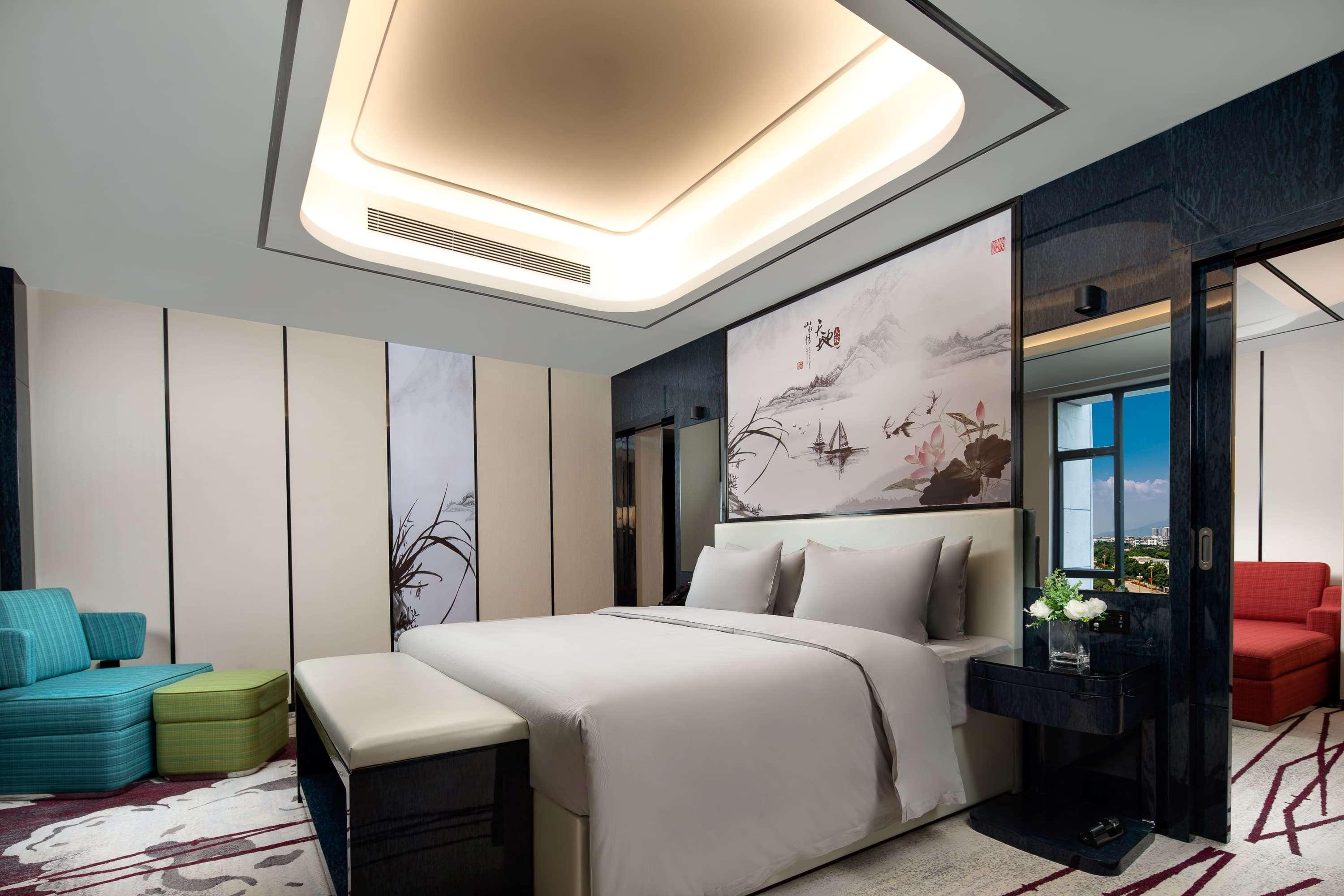Ramada By Wyndham Mengzi Suites Exterior photo