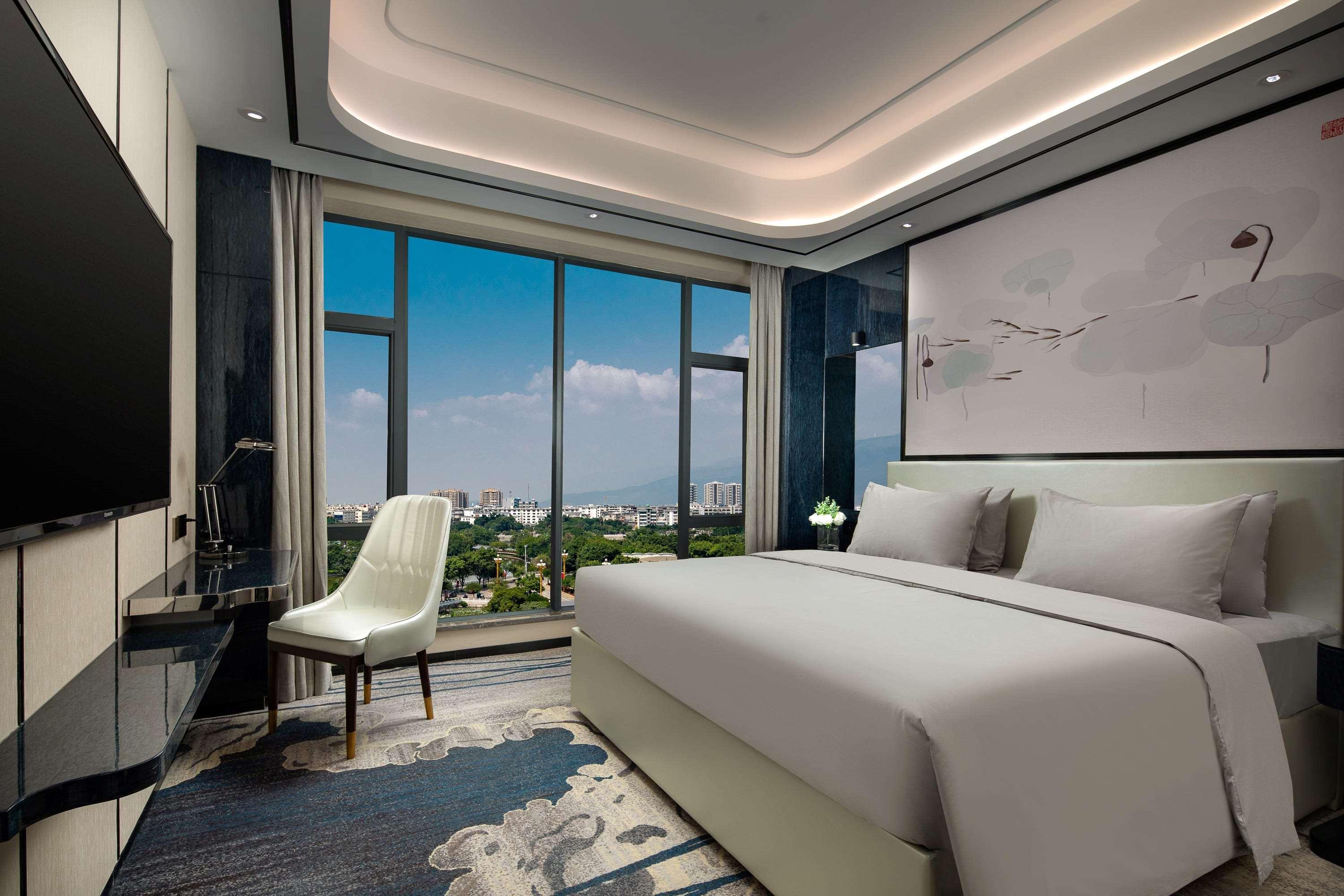 Ramada By Wyndham Mengzi Suites Exterior photo