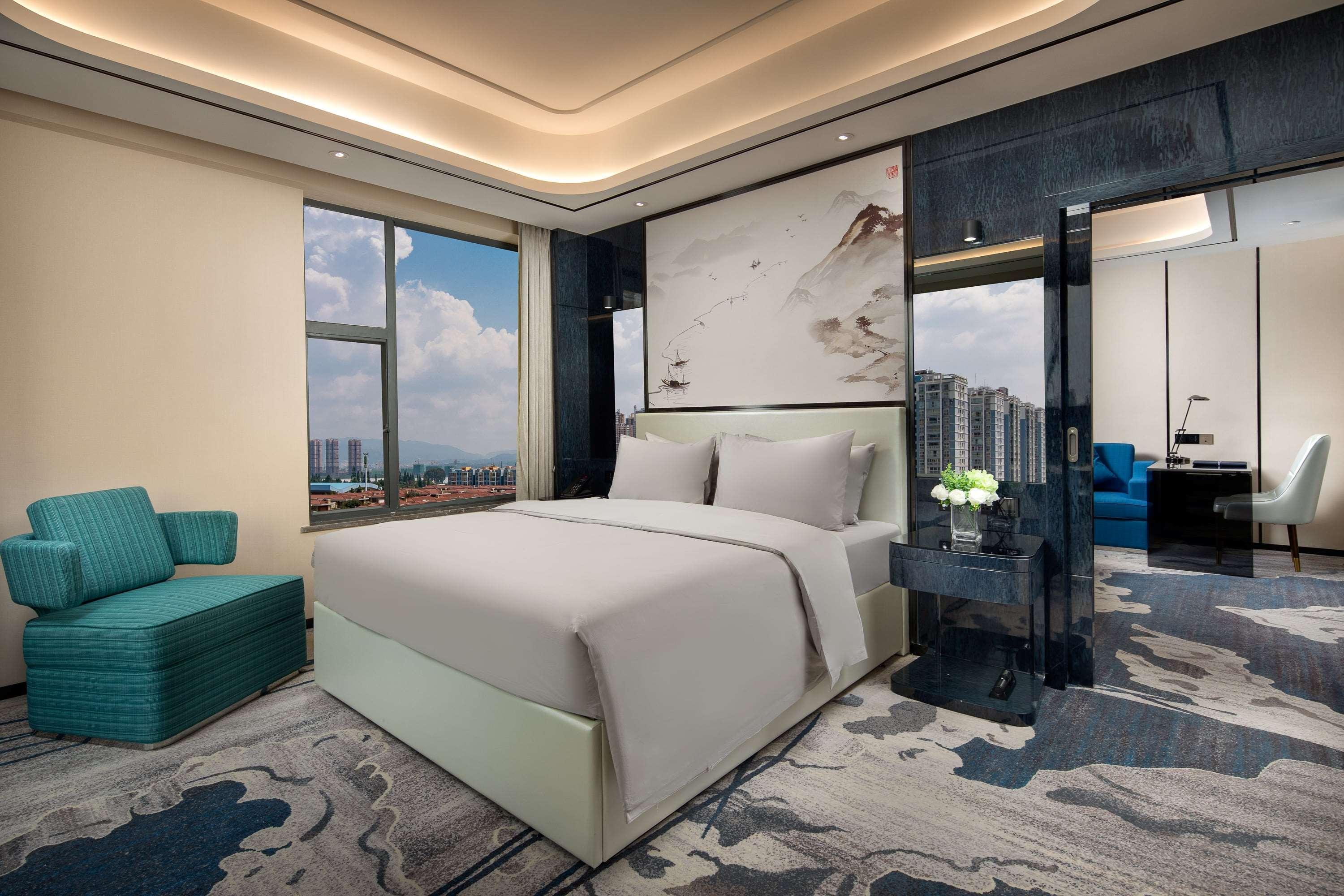 Ramada By Wyndham Mengzi Suites Exterior photo