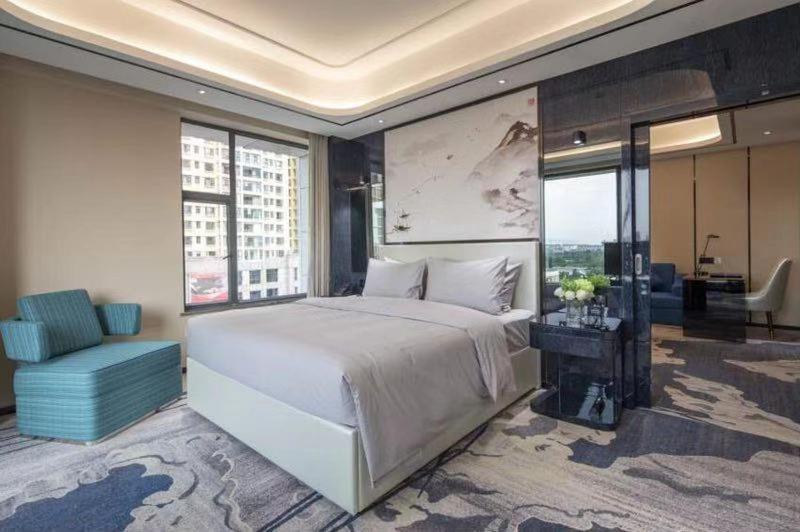 Ramada By Wyndham Mengzi Suites Exterior photo