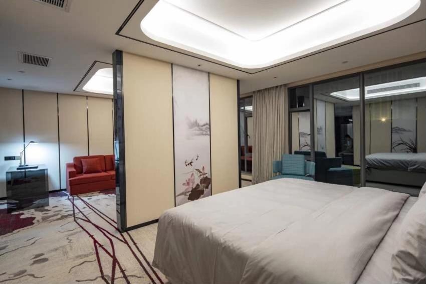Ramada By Wyndham Mengzi Suites Exterior photo